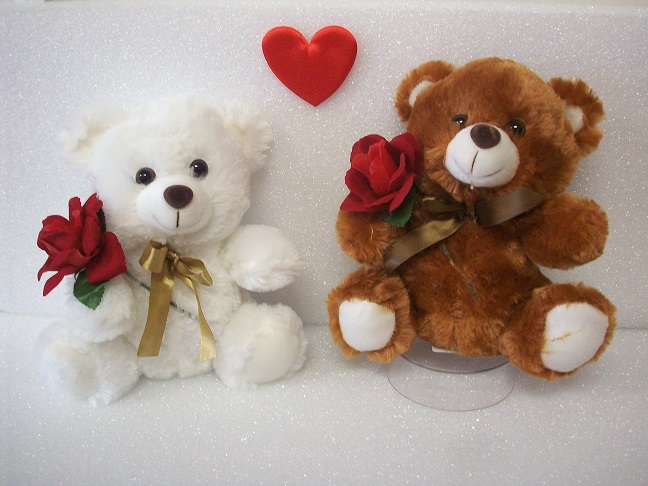 Bear holding rose